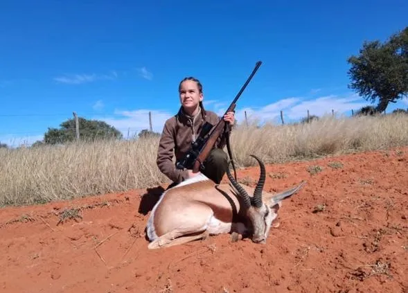 Photo of a 12-year-old hunter with her prize springbuck.