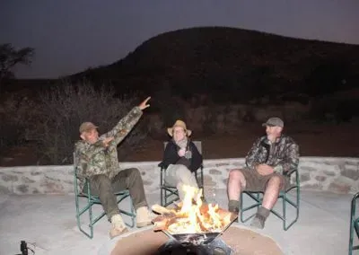 Hendrik-and-Trudi-Safaris-and-Tours-Gallery-People-around-a-fire-at-night