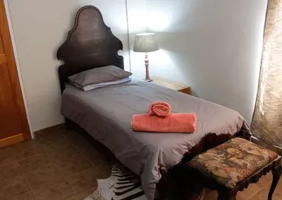 WARTHOG-PARADISE-room-bed